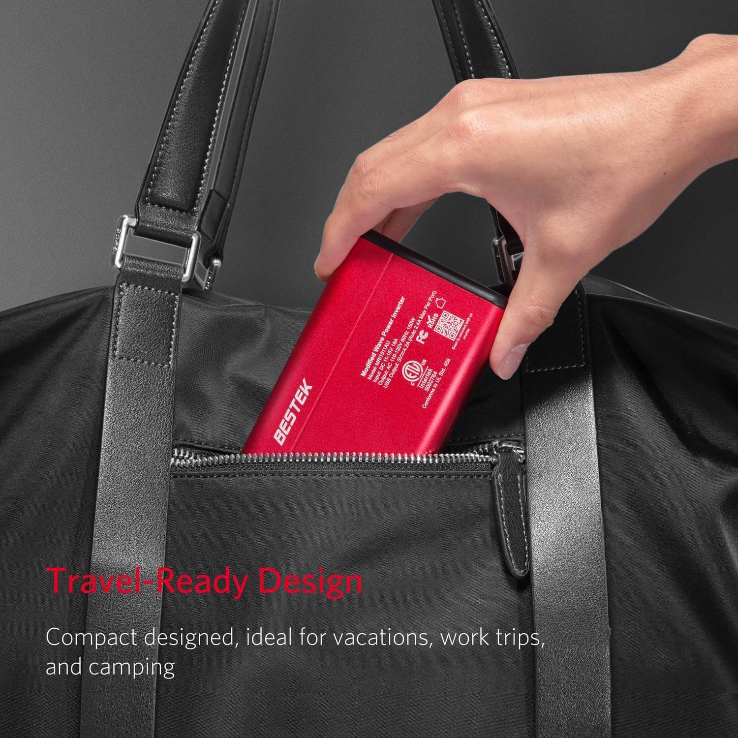 BESTEK 150W inverter — compact inverter being placed in a travel bag