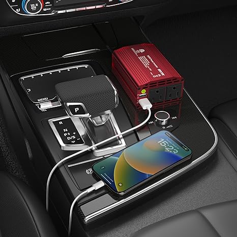 BESTEK 300W inverter — inverter charging devices on a car console