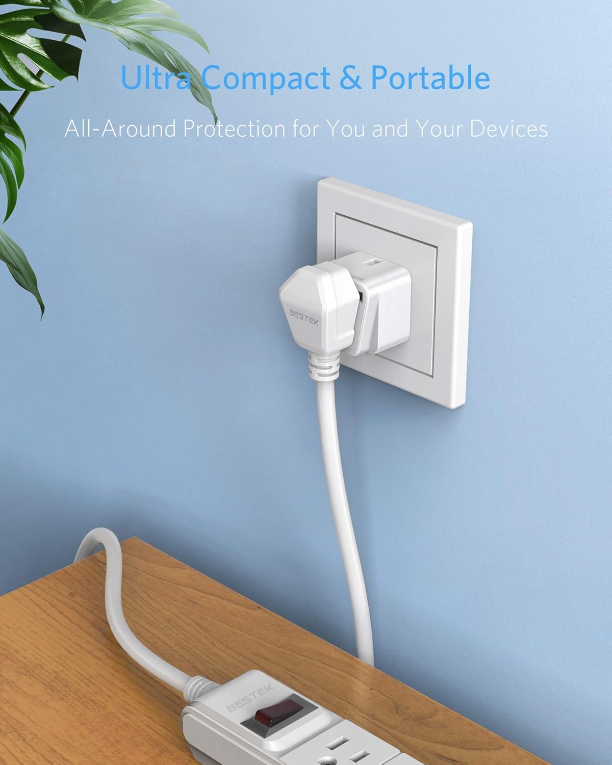 BESTEK travel plug adapter — plug adapter connected to a wall outlet