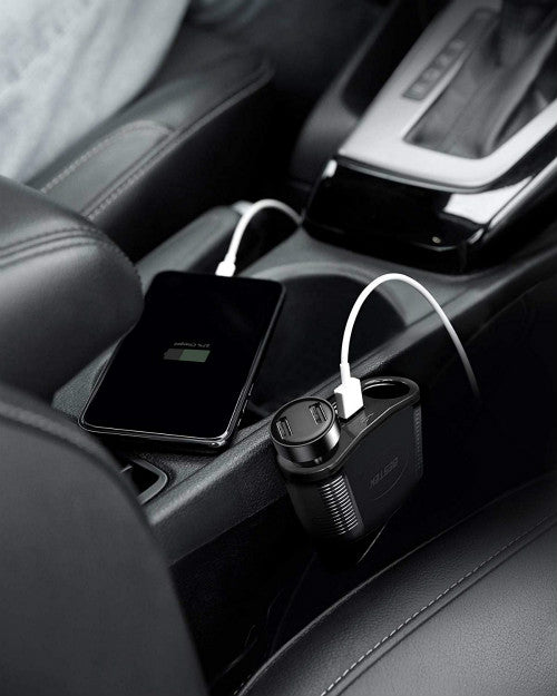 BESTEK 150W car socket splitter — splitter charging a phone beside the car console