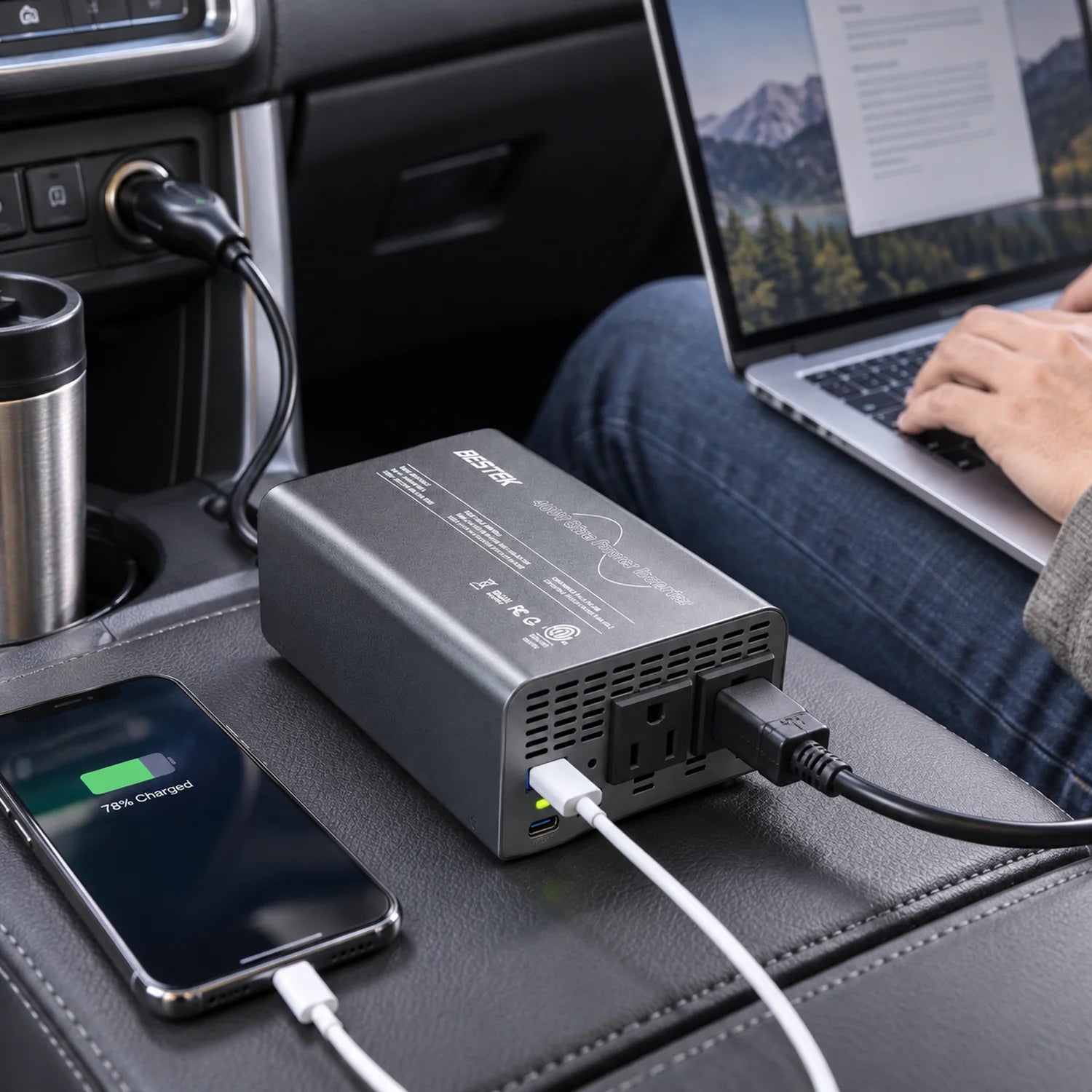 BESTEK 400W Pure Sine Wave Power Inverter DC 12V to AC 110V with PD30W USB-C QC 18W in a use setting