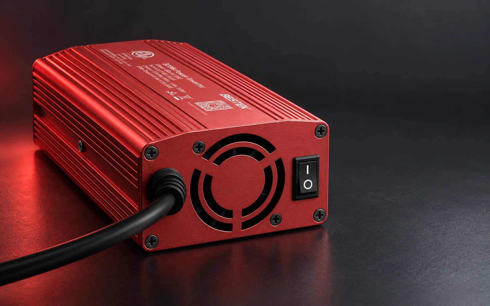 Rear panel of the BESTEK inverter showing the plain cable strain relief, center cooling fan and I/O power switch